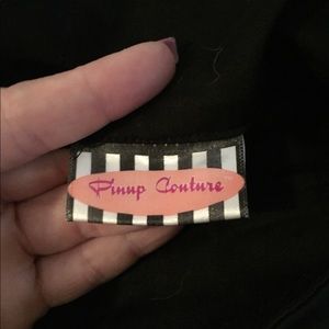 Pinup Couture high waisted zip up black skirt.